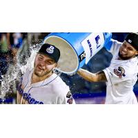 Blake Burke of the Biloxi Shuckers gets a shower