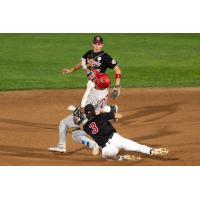 Fargo-Moorhead RedHawks infielder Aidan Byrne tags out a Winnipeg Goldeyes baserunner