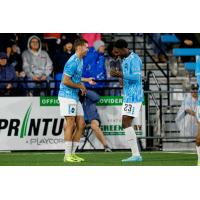 Colorado Springs Switchbacks FC's Tyler Clegg and Garven Métusala