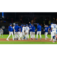 Tulsa Drillers celebrate a walk-off victory