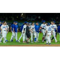 Tulsa Drillers celebrate a 13-inning win