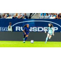 San Diego Wave FC's Perle Morroni and Gotham FC's Rose Lavelle on the field