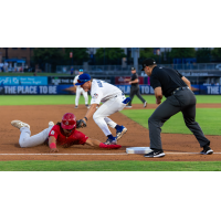 Tulsa Drillers third baseman Elijah Hainline applies the tag