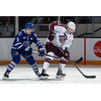 Peterborough Petes centre Brody Partridge (right)