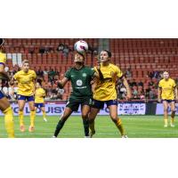 Racing Louisville FC's Ary Borges and Utah Royals FC's Claudia Zornoza in action