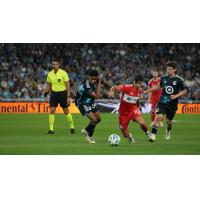 Chicago Fire FC's André Franco battles the Minnesota United FC