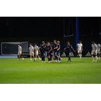 Chattanooga FC excahnges congratulations after a goal against New York City FC II