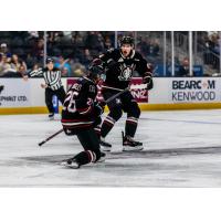 Red Deer Rebels right wing Talon Brigley (left) reacts after a goal