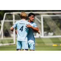 Chattanooga FC exchanges congratulations after beating Atlanta United 2