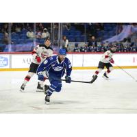 Syracuse Crunch left wing Wojciech Stachowiak vs. the Utica Comets