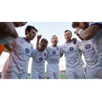 Louisville City FC huddle