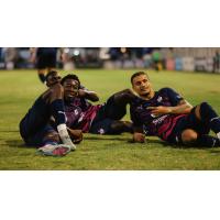 South Georgia Tormenta FC relax after a goal
