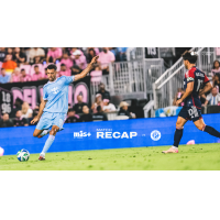 Inter Miami CF's Luis Suárez and New England Revolution's Carles Gil on game night
