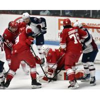 Allen Americans goaltender William Lavallière covers the puck against the Tulsa Oilers