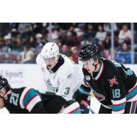 Seattle Thunderbirds' Ashton Cumby and Kelowna Rockets' Dawson Gerwing and Owen Folstrom on game night