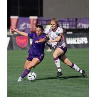 Calgary Wild FC midfielder Caleigh Boeckx (left) vs. Halifax Tides FC