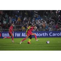 Natalie Jacobs of the North Carolina Courage battles for the ball