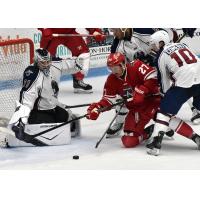 Allen Americans' Mark Duarte batles Tulsa Oilers' Troy Kobryn and Dallas Comeau