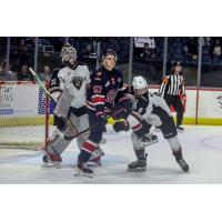 Vancouver Giants' Burke Hood and Lance McCloskey and Regina Pats' Zach Lansard on game night