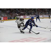 Syracuse Crunch defenseman Maxim Groshev (right) vs. the Hershey Bears