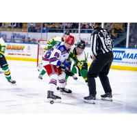 Kitchener Rangers centre Luca Romano tied up against the London Knights