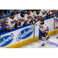 Rapid City Rush forward Blake Bennett received congratulations along the bench
