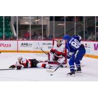 Belleville Senators defenseman Cameron Crotty and goaltender Leevi Meriläinen