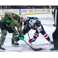 South Carolina Stingrays forward Kyler Kupka (right) faces off with the Savannah Ghost Pirates