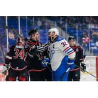 Adirondack Thunder defenseman Jacob Graves (left) vs. the Trois-Rivieres Lions