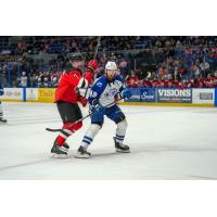 Utica Comets' Austin Strand and Syracuse Crunch's Scott Sabourin on game night