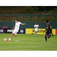 Rhode Island FC's Hugo Bacharach and New Mexico United's Gedion Zelalem on the field