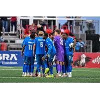 North Carolina FC huddles before the second half against Loudoun United FC