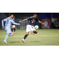 El Paso Locomotive FC's “Andy†Cabrera and Pittsburgh Riverhounds SC's Augie Williams in action
