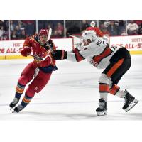 Allen Americans right wing Brayden Watts (left) vs. the Kansas City Mavericks