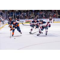 Saginaw Spirit defend against the Flint Firebirds