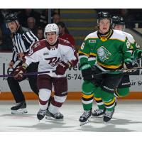 Peterborough Petes right wing Francis Parish (left) vs. the London Knights