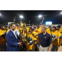 Former Charleston RiverDogs Manager Blake Butera (center)