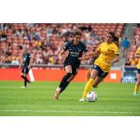 Washington Spirit midfielder Courtney Brown (left)