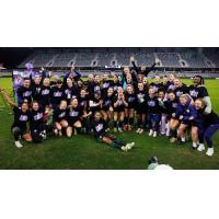 Racing Louisville FC pose after clinching a playoff berth