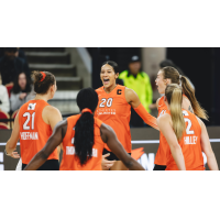 Reagan Cooper (center) with Athletes Unlimited