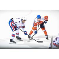 Syracuse Crunch right wing Mitchell Chaffee (right) vs. the Rochester Americans