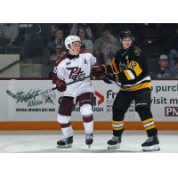 Peterborough Petes centre Braydon McCallum (left)