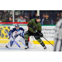 Manitoba Moose' Thomas Milic and Texas Stars' Curtis McKenzie in action