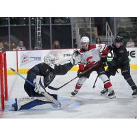 Wenatchee Wild's Cal Conway and Joshua Toll and Prince George Cougars' Jett Lajoie in action