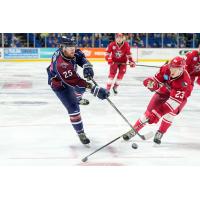 Allen Americans defenseman Sam Sedley (right) vs. the Tulsa Oilers