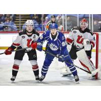 Syracuse Crunch center Gabriel Szturc in front of the Utica Comets goal