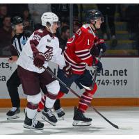 Peterborough Petes centre Aiden Young (left) vs. the Oshawa Generals