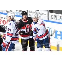 Belleville Senators and Rochester Americans share a laugh