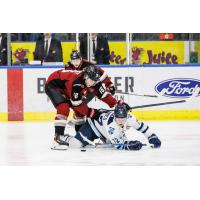 Vancouver Giants' Blake Chorney battles Penticton Vees' Caton Ryan