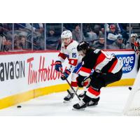 Belleville Senators defenceman Cameron Crotty (right) vs. the Laval Rocket